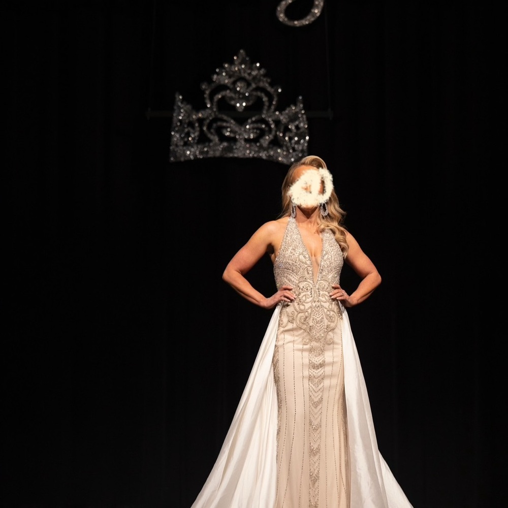 Elegant Cream Gown with Intricate Detailing